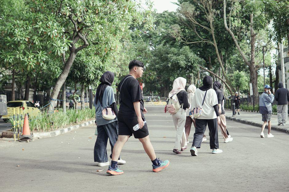 Group of People Walking in Jawa Barat Park